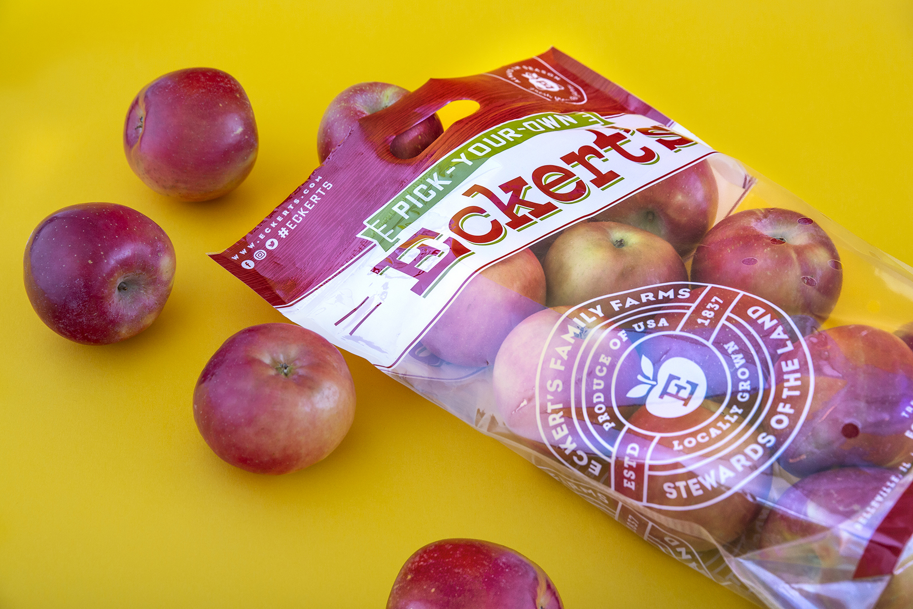 Photo of apple packaging on yellow background